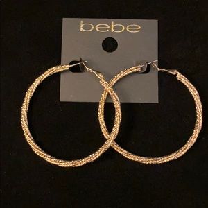 Bebe gold earrings